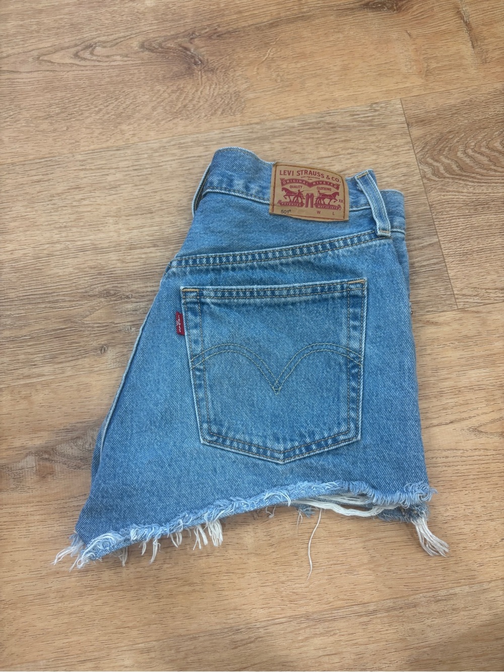 Levi's Light Blue Frayed Denim Cutoff Shorts